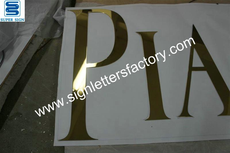 mirror brass letter signage